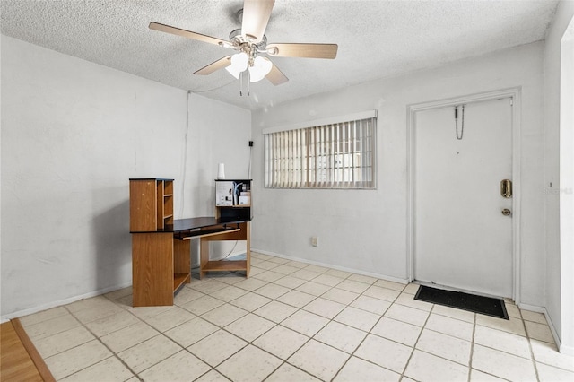 4500 E Bay Dr Unit 106, Clearwater, FL 33764 - unfurnished office with a ceiling fan, a textured ceiling, and baseboards