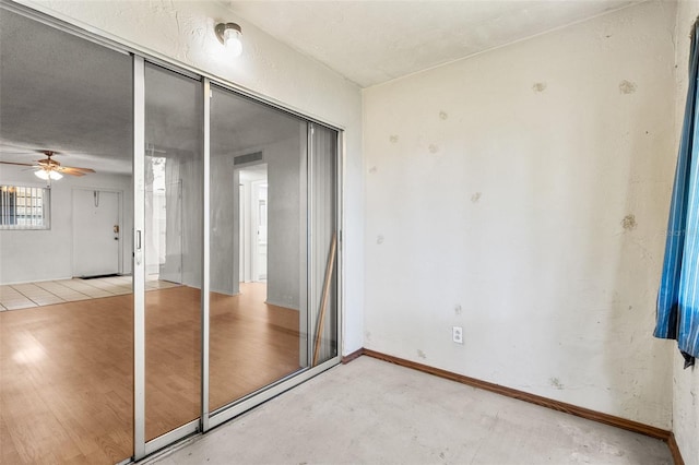 4500 E Bay Dr Unit 106, Clearwater, FL 33764 - empty room with ceiling fan and baseboards
