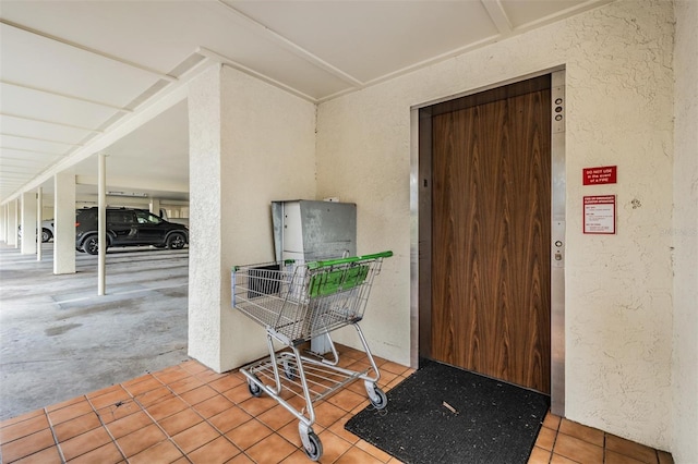 340 Causeway Blvd Unit 105, Dunedin, FL 34698 - view of exterior entry with elevator