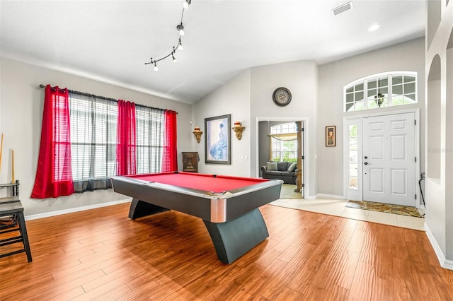 8814 N River Rd, Tampa, FL 33635 - recreation room with wood finished floors, baseboards, billiards table, lofted ceiling, and recessed lighting