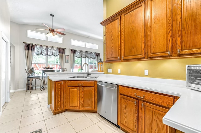 8814 N River Rd, Tampa, FL 33635 - kitchen with dishwasher, a sink, ceiling fan, and light countertops