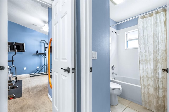 8814 N River Rd, Tampa, FL 33635 - bathroom featuring shower / bath combination with curtain, toilet, ceiling fan, and baseboards