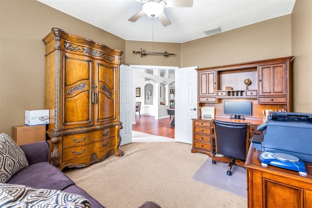 8814 N River Rd, Tampa, FL 33635 - office with a ceiling fan, carpet floors, and arched walkways