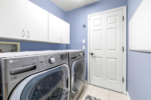 8814 N River Rd, Tampa, FL 33635 - laundry area with cabinet space, independent washer and dryer, baseboards, and light tile patterned flooring