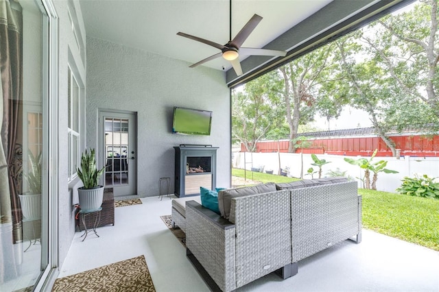 8814 N River Rd, Tampa, FL 33635 - fenced backyard with a patio, an outdoor hangout area, and ceiling fan