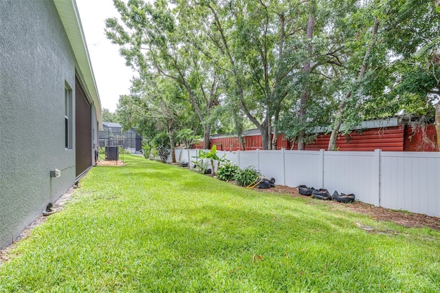 8814 N River Rd, Tampa, FL 33635 - view of yard with central AC unit