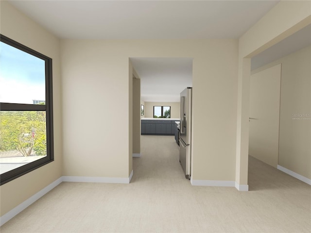 650 Island Way Unit 408, Clearwater Beach, FL 33767 - unfurnished room featuring light carpet