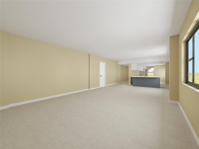 650 Island Way Unit 408, Clearwater Beach, FL 33767 - unfurnished living room featuring light colored carpet
