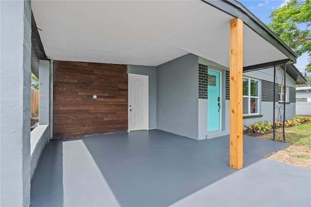 4841 Drift Tide Dr, New Port Richey, FL 34652 - view of patio with a carport