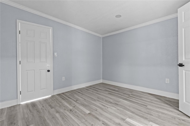 4841 Drift Tide Dr, New Port Richey, FL 34652 - empty room featuring ornamental molding and light wood-style floors