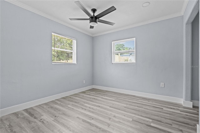 4841 Drift Tide Dr, New Port Richey, FL 34652 - unfurnished room with plenty of natural light, crown molding, light wood-style floors, and a ceiling fan