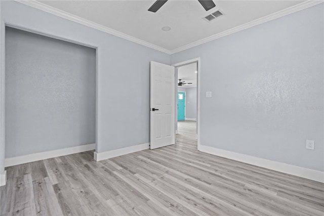 4841 Drift Tide Dr, New Port Richey, FL 34652 - unfurnished room with a ceiling fan, wood finished floors, and ornamental molding