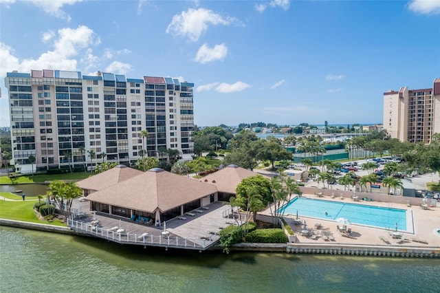 9525 Blind Pass Rd Unit 505, St Pete Beach, FL 33706 - bird's eye view of a large body of water, apartment complex, and a pool