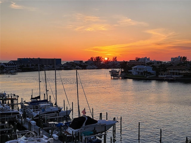 9525 Blind Pass Rd Unit 505, St Pete Beach, FL 33706 - dock area with boat lift and a water view