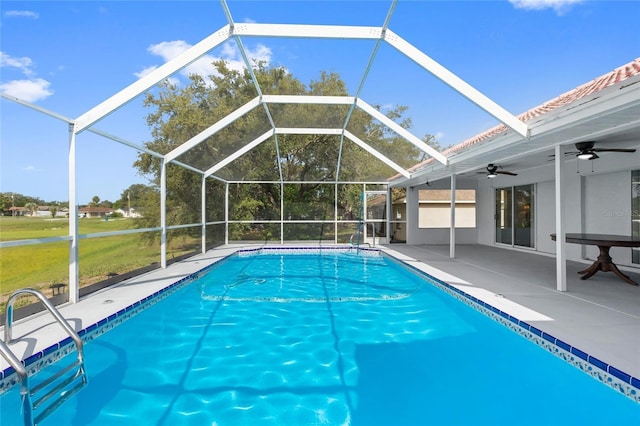 10446 Baylor Dr, Spring Hill, FL 34608 - swimming pool with ceiling fan and a patio area