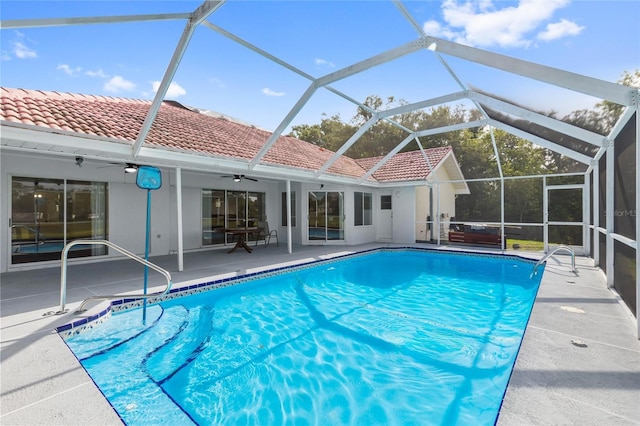 10446 Baylor Dr, Spring Hill, FL 34608 - outdoor pool with ceiling fan and a patio