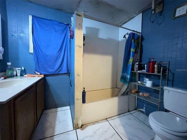 14210 Downing St, Dover, FL 33527 - bathroom featuring toilet, shower / tub combo with curtain, vanity, and marble finish flooring