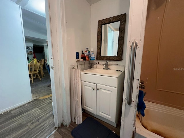 14210 Downing St, Dover, FL 33527 - bathroom with vanity and wood finished floors