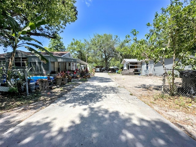 14210 Downing St, Dover, FL 33527 - view of asphalt driveway