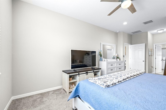 30762 Parrot Reef Ct, Wesley Chapel, FL 33545 - bedroom with light carpet, baseboards, and a ceiling fan
