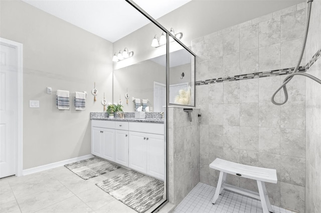 30762 Parrot Reef Ct, Wesley Chapel, FL 33545 - full bath with vanity, a tile shower, and tile patterned floors