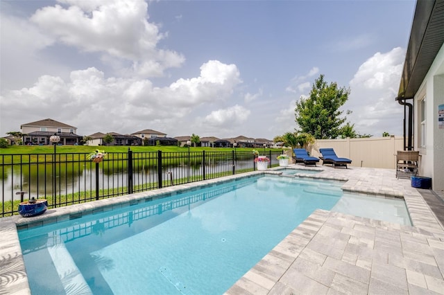 30762 Parrot Reef Ct, Wesley Chapel, FL 33545 - view of pool with a fenced backyard, a patio, a residential view, a water view, and a pool with connected hot tub
