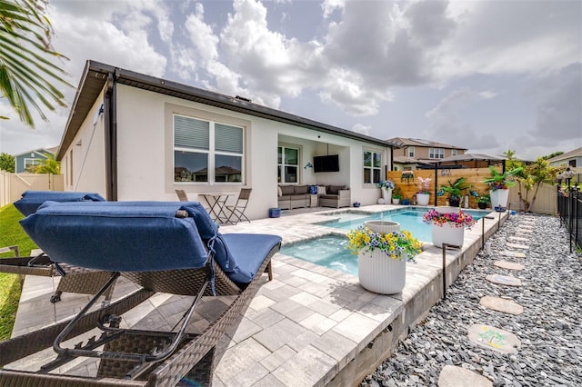 30762 Parrot Reef Ct, Wesley Chapel, FL 33545 - view of swimming pool featuring an outdoor living space, a fenced backyard, and a patio