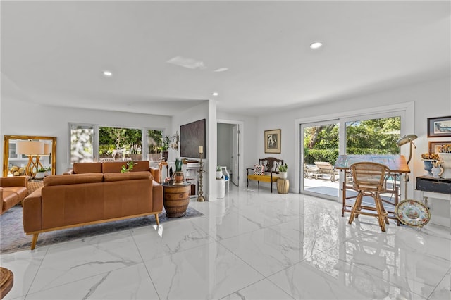 208 Live Oak Ln, Largo, FL 33770 - living room featuring healthy amount of natural light, light marble finish flooring, and recessed lighting