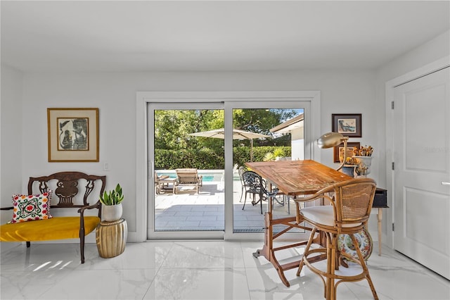 208 Live Oak Ln, Largo, FL 33770 - dining area featuring marble finish flooring
