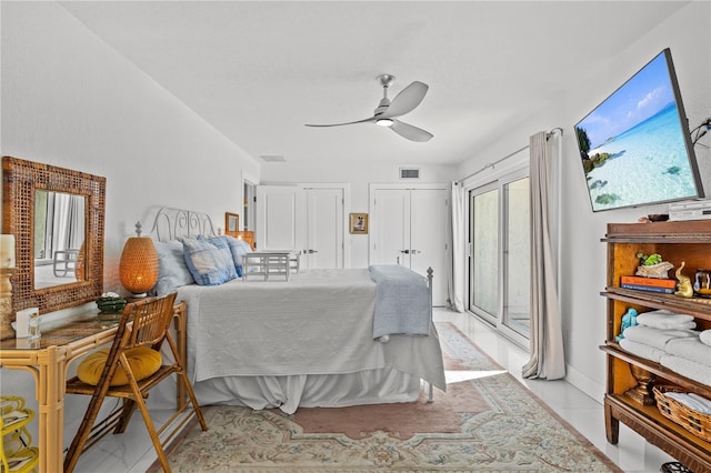 208 Live Oak Ln, Largo, FL 33770 - bedroom with access to exterior, multiple closets, and ceiling fan