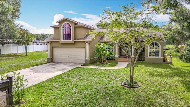 1332 Osceola Hollow Rd, Odessa, FL 33556 - traditional-style house featuring stucco siding, concrete driveway, and a garage