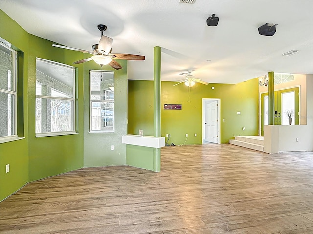 1332 Osceola Hollow Rd, Odessa, FL 33556 - unfurnished living room with ceiling fan and wood finished floors