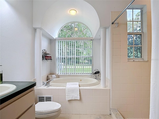 1332 Osceola Hollow Rd, Odessa, FL 33556 - bathroom with a garden tub, healthy amount of natural light, toilet, and a tile shower