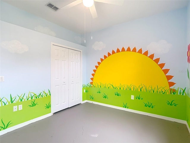 1332 Osceola Hollow Rd, Odessa, FL 33556 - unfurnished bedroom with finished concrete flooring, a closet, baseboards, and ceiling fan