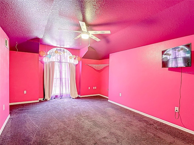 1332 Osceola Hollow Rd, Odessa, FL 33556 - carpeted spare room with ceiling fan, a textured ceiling, and lofted ceiling