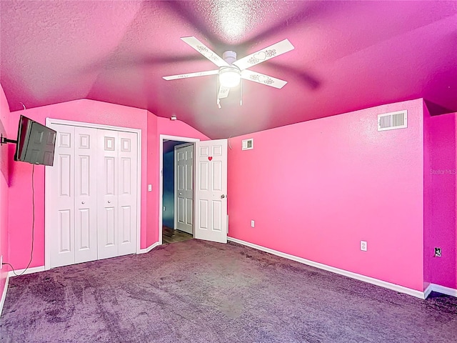 1332 Osceola Hollow Rd, Odessa, FL 33556 - unfurnished bedroom featuring lofted ceiling, carpet floors, a textured ceiling, a closet, and baseboards