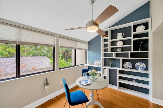 1111 N Bayshore Blvd Unit E10, Clearwater, FL 33759 - dining area featuring vaulted ceiling, plenty of natural light, wood finished floors, and ceiling fan