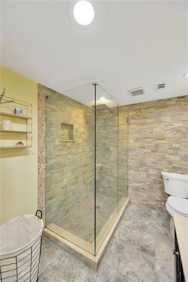 1111 N Bayshore Blvd Unit E10, Clearwater, FL 33759 - bathroom featuring a stall shower and recessed lighting
