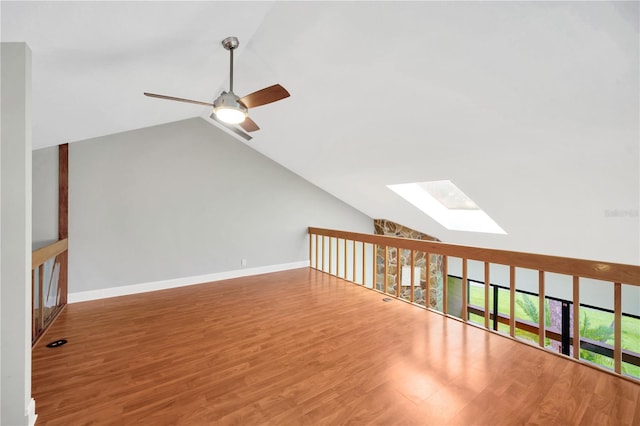 1111 N Bayshore Blvd Unit E10, Clearwater, FL 33759 - additional living space with a skylight, vaulted ceiling, ceiling fan, and wood finished floors