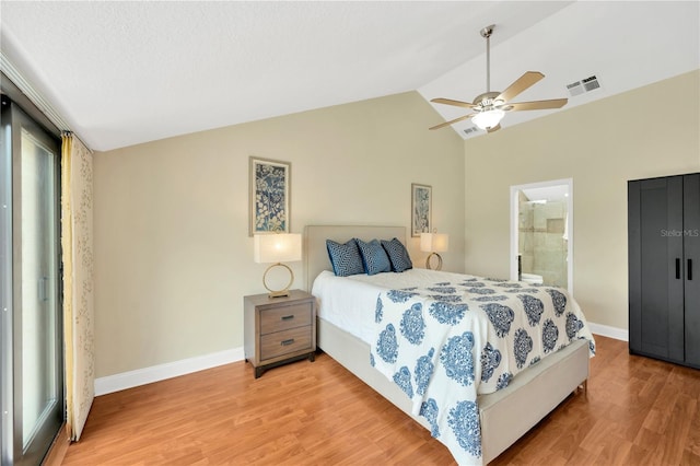 1111 N Bayshore Blvd Unit E10, Clearwater, FL 33759 - bedroom with lofted ceiling, light wood-style flooring, a ceiling fan, and connected bathroom