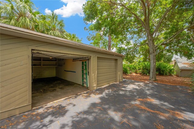 1111 N Bayshore Blvd Unit E10, Clearwater, FL 33759 - garage with asphalt driveway
