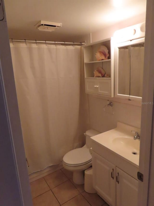 364 115th Ave N Unit 1, Saint Petersburg, FL 33716 - bathroom with vanity, tile patterned floors, and curtained shower