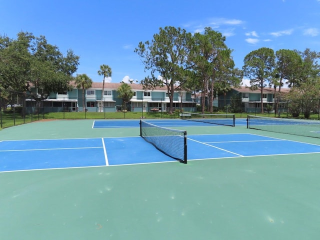 364 115th Ave N Unit 1, Saint Petersburg, FL 33716 - view of tennis court featuring community basketball court