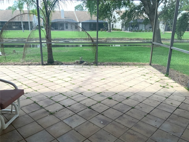 5530 Salem Square Dr N, Palm Harbor, FL 34685 - view of patio featuring a water view and a residential view