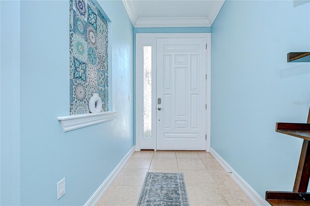 1411 Tessano Pl, Palm Harbor, FL 34683 - foyer entrance featuring ornamental molding, baseboards, and tile patterned flooring