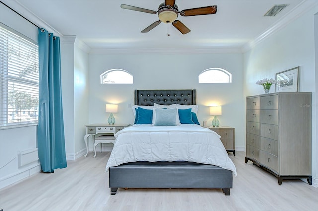 1411 Tessano Pl, Palm Harbor, FL 34683 - bedroom featuring ornamental molding, light wood-style floors, baseboards, and a ceiling fan