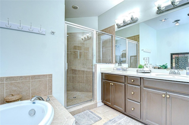 1411 Tessano Pl, Palm Harbor, FL 34683 - bathroom with a stall shower, double vanity, a garden tub, and tile patterned flooring