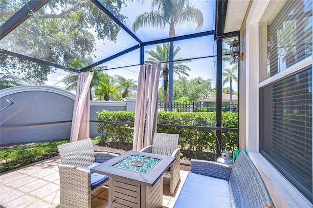 1411 Tessano Pl, Palm Harbor, FL 34683 - sunroom / solarium featuring an outdoor fire pit