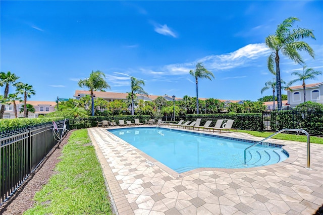 1411 Tessano Pl, Palm Harbor, FL 34683 - community pool with a fenced backyard and a patio
