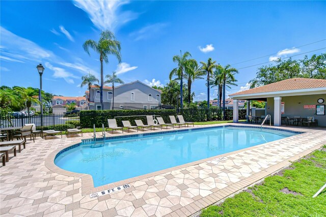 1411 Tessano Pl, Palm Harbor, FL 34683 - community pool with a patio area
